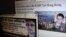 An interview of Edward Snowden by the South China Morning Post newspaper (top) and a website supporting Snowden in Hong Kong, are displayed on a computer screen in Hong Kong in this June 12, 2013 illustration photo.