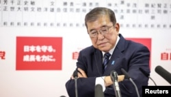 Japan's Prime Minister Shigeru Ishiba speaks to the media at the Liberal Democratic Party's (LDP) headquarters, Oct. 27, 2024 in Tokyo.