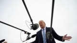 President Donald Trump speaks to the press before boarding Air Force One in Andrews Air Force Base, Md., Saturday, March 28, 2020. Trump is en route to Norfolk, Va., for the sailing of the USNS Comfort, which is headed to New York. (Jim Watson/Pool…