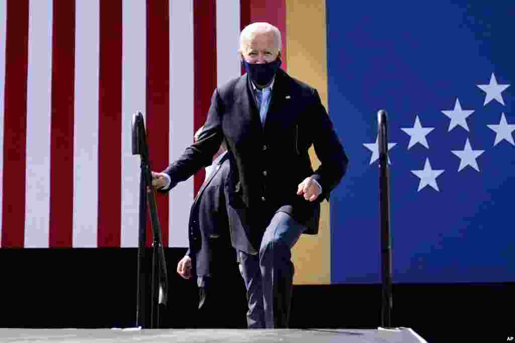 Democratic presidential candidate former Vice President Joe Biden arrives to speak during a campaign event at Riverside High School in Durham, N.C., Oct. 18, 2020.