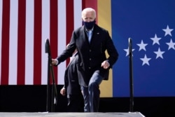 Democratic presidential candidate former Vice President Joe Biden arrives to speak during a campaign event at Riverside High School in Durham, N.C., Oct. 18, 2020.