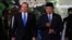 FILE - Australian Prime Minister Tony Abbott (L) walks beside Indonesian President Susilo Bambang Yudhoyono at the Presidential Palace in Jakarta, September 30, 2013. 