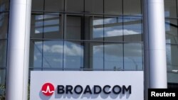 FILE - The Broadcom Limited company logo is shown outside one of their office complexes in Irvine, California, March 4, 2021.