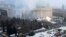 Smoke rises from the city hall building during a protest in Almaty, Kazakhstan, Jan. 5, 2022.