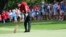 Tiger Woods hits from the fifth fairway during the final round of the Tour Championship golf tournament, Sept. 23, 2018, in Atlanta.