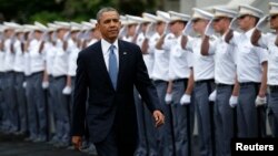 FILE - President Barack Obama attends a commencement ceremony at the U.S. Military Academy in West Point, New York, in 2014.