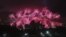 FILE - Fireworks explode behind Sydney's Opera House during New Year's celebrations, Australia, Dec. 31, 2013.