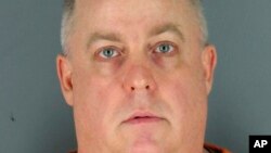 This undated photo provided by the Hennepin County Jail shows Lloyd Edward Johnson.