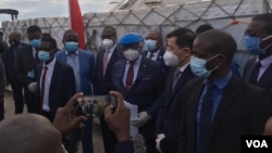 Vice President Constantino Chiwenga, some state officials and Chinese representatives receiving the Sinopharm COVID-19 vaccines donated by China.