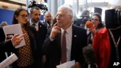 European Union foreign policy chief Josep Borrell is surrounded by reporters at the European parliament, Jan.14, 2020 in Strasbourg, eastern France. 