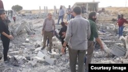 Civilians under the buildings destroyed by Turkish attacks in Ras al-Ain 