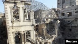 An Ottoman-era building damaged by an air strike at a besieged area in Homs, November 28, 2012.