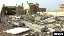 A still image taken from a video shot on June 29, 2018, shows damaged buildings inside the headquarters of the G5 Sahel military task force in Sevare, Mali.