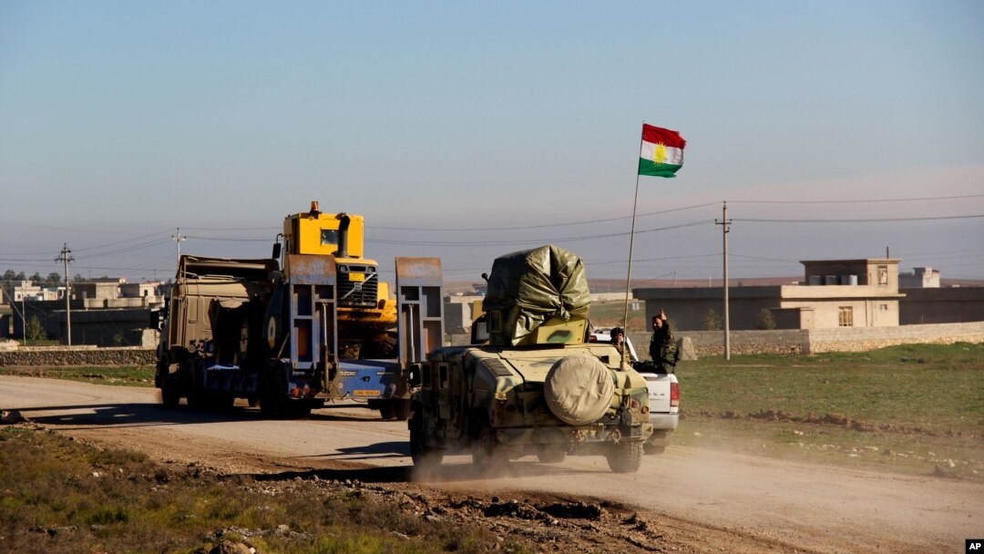 Kurdish peshmerga forces prepare for battle against the Islamic State group, near the Mosul Dam, in Iraq, Jan. 20, 2015.