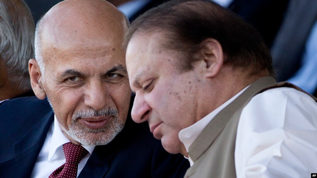 FILE - Afghan President Ashraf Ghani (left) talks with Pakistani Prime Minister Nawaz Sharif in Islamabad, Pakistan. 