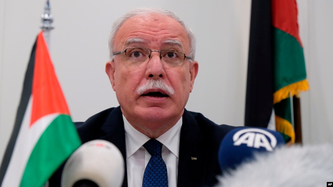 Palestinian Foreign Minister Riad Malki speaks during a press conference at the International Criminal Court in The Hagues, Netherlands, May 22, 2018. Malik said, Jan. 8, 2023, that Israel revoked his travel permit.