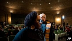 FILE - Rev. Jamie Eaddy-Chism, a theologian and activist, takes the stage as a speaker during a public commemoration for 19 unidentified Black Philadelphians at the University of Pennsylvania's Penn Museum on February 3, 2024, in Philadelphia.