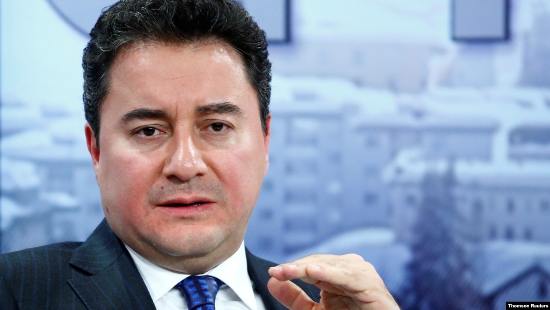 FILE - Former Turkish official Ali Babacan gestures during a meeting in Davos, Switzerland, July 11, 2019.