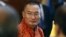FILE - Bhutan's Prime Minister Tshering Tobgay looks on during a meeting with Sri Lanka's President Maithripala Sirisena (not pictured) in Colombo, April 10, 2015.