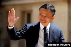 FILE - Jack Ma, chairman of the Alibaba Group, arrives at the "Tech for Good" Summit in Paris, France, Jan. 20, 2021.