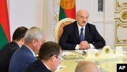 Belarusian President Alexander Lukashenko chairs a Security Council meeting in Minsk, Belarus, Aug. 18, 2020.