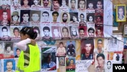 Zid zgrade suda u Bengaziju izljepljen slikama poginulih u borbi protiv vladavine libijskog lidera Moammera Gadhafija