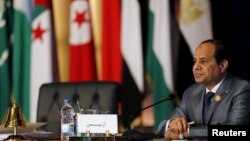 FILE - Egyptian President Abdel Fattah el-Sissi regards the Muslim Brotherhood as part of a terrorist network, while the Brotherhood insists it is a peaceful organization.