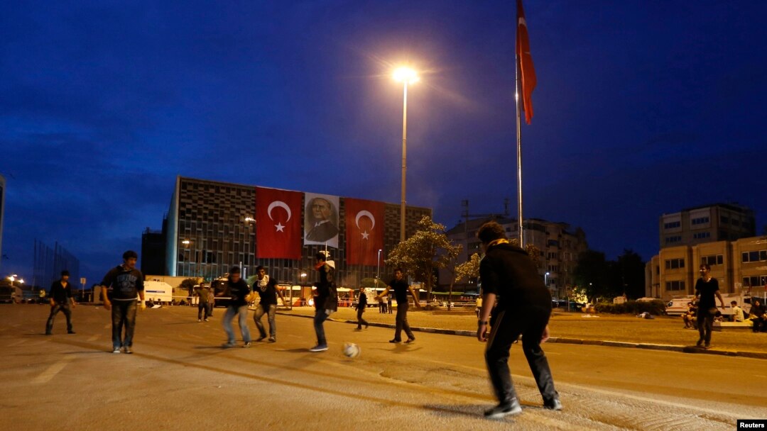 Anti-government protesters play soccer at Taksim Square in Istanbul, June 13, 2013.