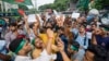 FILE - Hindus hold a rally condemning violence against them and other religious groups, in Dhaka, Bangladesh, on Aug. 12, 2024.