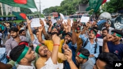 Hindus in Bangladesh hold a rally condemning violence against them and other religious groups in the Muslim-majority country, in Dhaka, Bangladesh, Monday, Aug. 12, 2024. 