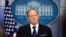 White House press secretary Sean Spicer listens to a reporter's question during a briefing at the White House, June 20, 2017 in Washington. 