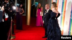 Kennedy Center Honoree Billy Joel and girlfriend Alexis Roderick arrive for the Kennedy Center Honors in Washington, Dec. 8, 2013. 