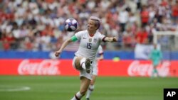 United States' Megan Rapinoe eyes the ball during the Women's World Cup round of 16 soccer match between Spain and the United States at Stade Auguste-Delaune in Reims, France, June 24, 2019.