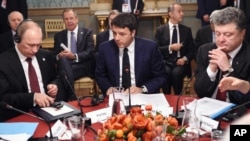 Владимир Путин, Маттео Ренци и Петр Порошенко. Милан, Италия, 17 октября 2014.