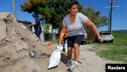 Residents fill sandbags in preparation for Tropical Storm Nate in New Orleans, Louisiana, Oct. 6, 2017. 