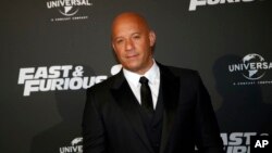 Actor Vin Diesel poses during the premiere of Fast and Furious 8, in Paris, Wednesday, April 5, 2017. 