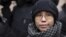 Liu Xia, the wife of Chinese dissident Liu Xiaobo, talks to the media in Beijing February 11, 2010. 