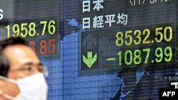 Бедствие в Японии вызвало панику на мировых фондовых рынках
