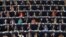 FILE - Members of the European Parliament take part in a voting session in Strasbourg, France, April 12, 2016. 
