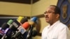 Sudanese Health Minister Akram al-Tom speaks during a press conference in Khartoum, Sudan, March 13, 2020. 