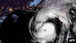 Cette image obtenue par la National Oceanic and Atmospheric Administration (NOAA) montre l'ouragan Helene le 26 septembre 2024, à 11:51 UTC.