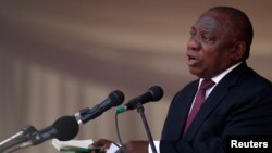 President of South Africa Cyril Ramaphosa speaks during a state funeral of Zimbabwe's longtime ruler Robert Mugabe, at the national sports stadium in Harare, Zimbabwe, Sept. 14, 2019.