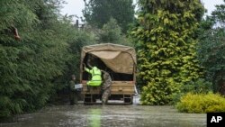 Pasukan keamanan Selandia Baru dikerahkan untuk melakukan evakuasi keluarga yang terjebak banjir di Canterbury (foto: dok). 