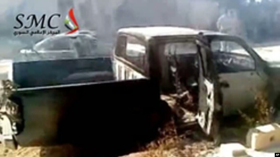 An image from video shows what Syrian anti-regime activists say is destruction and burnt vehicles in the village of Ibleen in northwestern Jabal Al-Zawiyah (region) after it was stormed by army troops. (AFP cannot independently verify the editorial conten