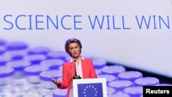 FILE - European Commission President Ursula von der Leyen speaks at a press conference after a visit to a production facility of U.S. pharmaceutical company Pfizer, in Puurs, Belgium April 23, 2021.