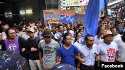 Youth activists in Yangon, including Thet Swe Win and Moe Thway, protest continuing civil war in Myanmar.