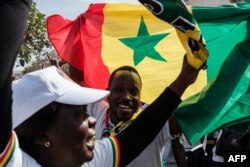 FILE —Supporters of Senegal's current President rally to support their leader in Dakar on February 24, 2024.