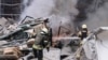 Vatrogasci gase vatru posle ruskog napada na Harkov (Foto:AP/Yevhen Titov)