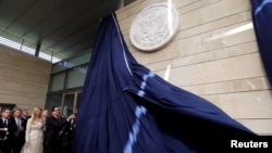 U.S. Treasury Secretary Steven Mnuchin unveils the seal for the new U.S. embassy during the dedication ceremony of the new U.S. embassy in Jerusalem, May 14, 2018.