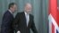 Russia's Foreign Minister Sergey Lavrov (l) and his British counterpart William Hague walk to a press conference after their meeting in Moscow, May 28, 2012 (AP).